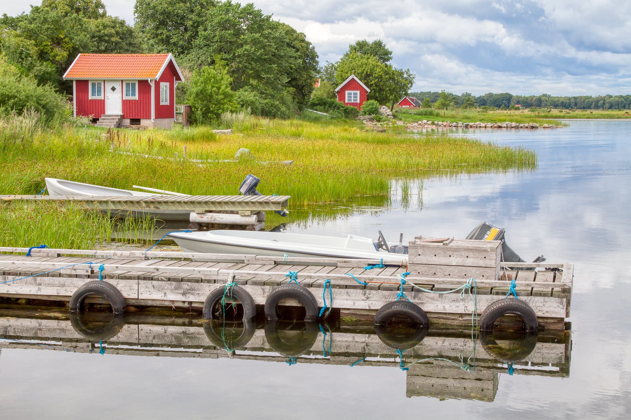 Kristianopel Resort uppifrån med stugor, camping och hav